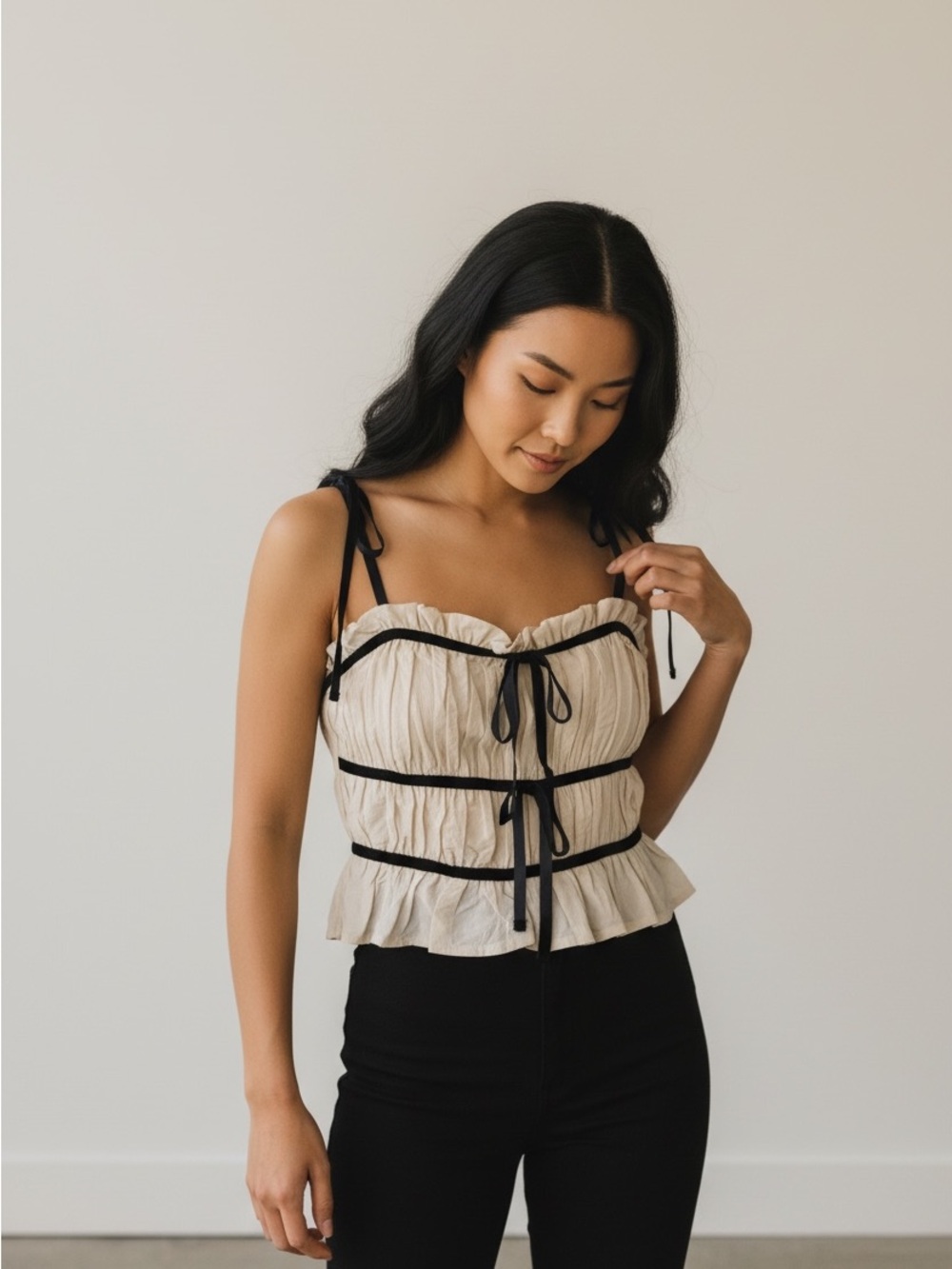 Ruffled Tie-Front Bustier Top in Cream with Black Trim